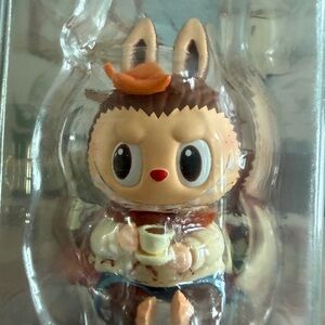 Zimomo Warm Sweater Figure hang card. Sealed.